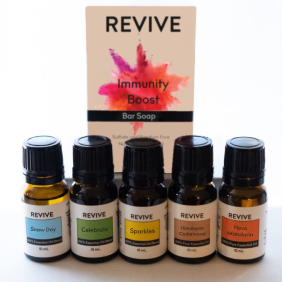 A $75+ Value for $65.
1.Snow Day: Snow Days are magical no matter your age! When the world is blanketed in snow everything seems calm and quiet. REVIVE Snow Day bring feelings of clarity and calm, with a blend of minty and woodsy aromas.
2.Nova Mandarin: Nova Mandarin is a hybrid of Clementine mandarin and Orlando Tangelo. It provides a super sweet and juicy citrus scent. This mouthwatering oil is cold pressed from the American fruit.
3. Celebrate: What better way to Celebrate the New Year than with a Signature Blend that is fresh, sweet and floral? This joyful blend will channel positivity and renewal in 2021.
4. Himalayan Cedarwood: A balsamic and smoky aroma with a hint of spice. It is steam distilled from the large Indian tree and has similar traits to Atlas Cedarwood.
5.Sparkles: Sparkles make everything better right? Sparkly nail polish, sparkly tops, and our favorite…. sparkly coffee mugs! We decided that this year needed some sparkles too! REVIVE Sparkles promotes feelings of vibrancy, freshness, and positivity using a citrus and herb blend.
6. Immunity Boost Bar Soap: Formulated with the power of REVIVE’s Immunity Boost Essential Oil Blend, this bar soap has simple ingredients designed to keep you and your family clean without drying skin out