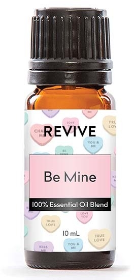  Flowers, Jewelry, or Candy... What is your favorite way to celebrate love? We have a slight bias, but think a BRAND NEW Blend is the best way to celebrate! Be Mine is a minty blend with slightly sweet and floral under notes.

REVIVE Be Mine is a proprietary blend of Camphor, Peppermint, Wintergreen, Ylang Ylang and Osmanthus Essential Oil.


	
		
			
Free Shipping & Returns

		 
	 


	
		
			
GC/SM tested (Certified Pure)


		 
	 


	
		
			
No MLM Hassle