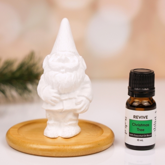 REVIVE's New Gnome Passive Diffuser is a fun, whimsical personal diffuser that makes a great addition to any office desk, bathroom, or nightstand. The Gnome rests on a circular Bamboo Base that is functional and stylish!
No cords or batteries needed | Reusable | Small Space Diffusing
Christmas Tree Size: 3.5"H x 1.7"D
Bamboo Base: 3"D

	
		
			
Free Shipping & Returns

		 
	 


	
		
			
GC/SM tested (Quality Tested)


		 
	 


	
		
			
No MLM Hassle
